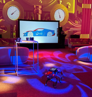 Animations futuristes signées Just WAOUH lors de la fête du personnel NSI au Château d’Hélécine : chien robot interactif et Digital Graffiti.
